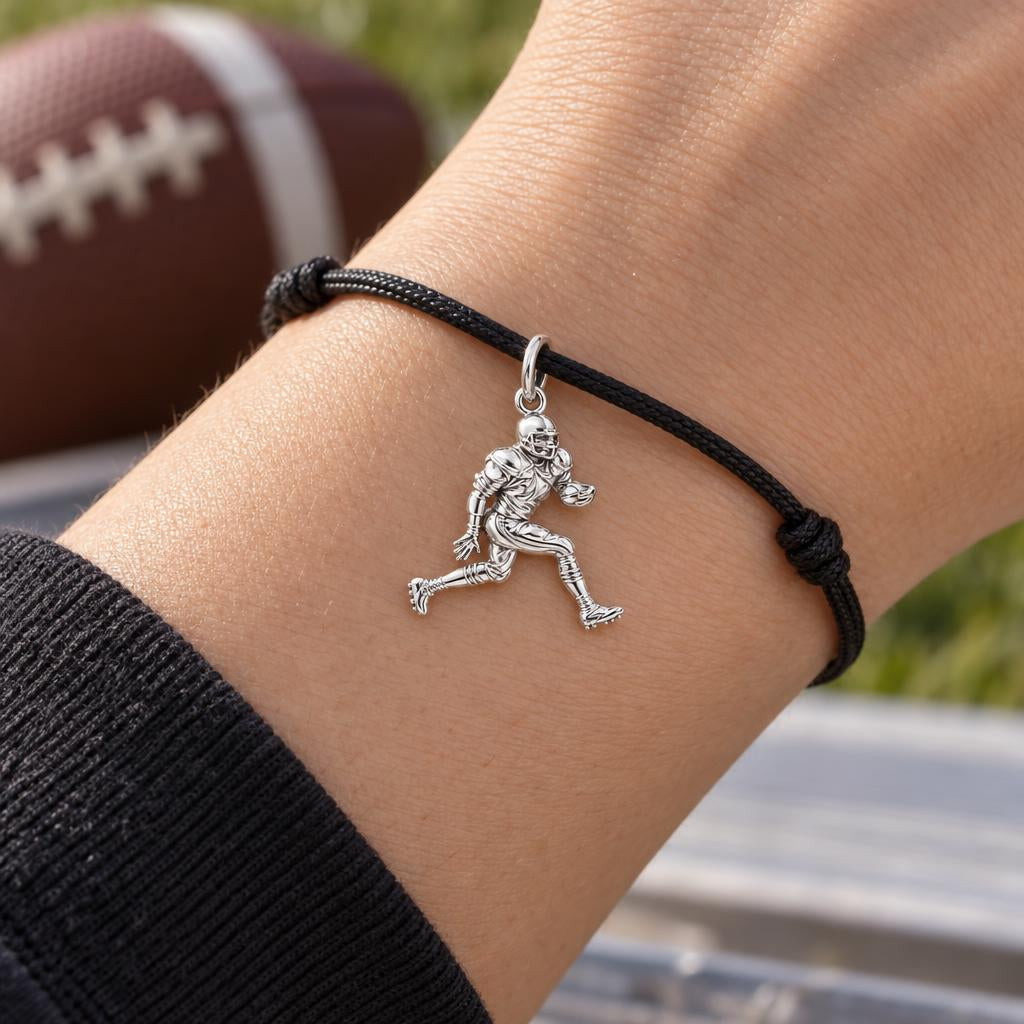 Gridiron Glory Player Charm Bracelet – Personalized Athlete Gift – worn on the wrist on a black cord bracelet