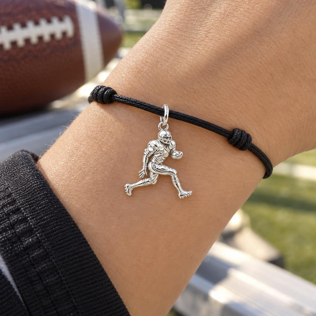 Gridiron Glory Player Charm Bracelet – Personalized Athlete Gift – worn on the wrist on a black cord bracelet