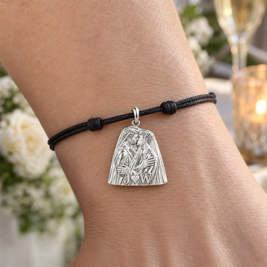 Groom's First Kiss Charm Bracelet – Personalized Couple Gift – worn on the wrist on a black cord bracelet