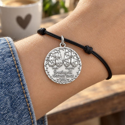 Growing Old Together Charm Bracelet – Personalized Couple Gift – worn on the wrist on a black cord bracelet