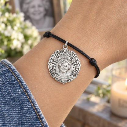 Guardian Angel Wings Charm Bracelet – Personalized Memorial Gift – worn on the wrist on a black cord bracelet