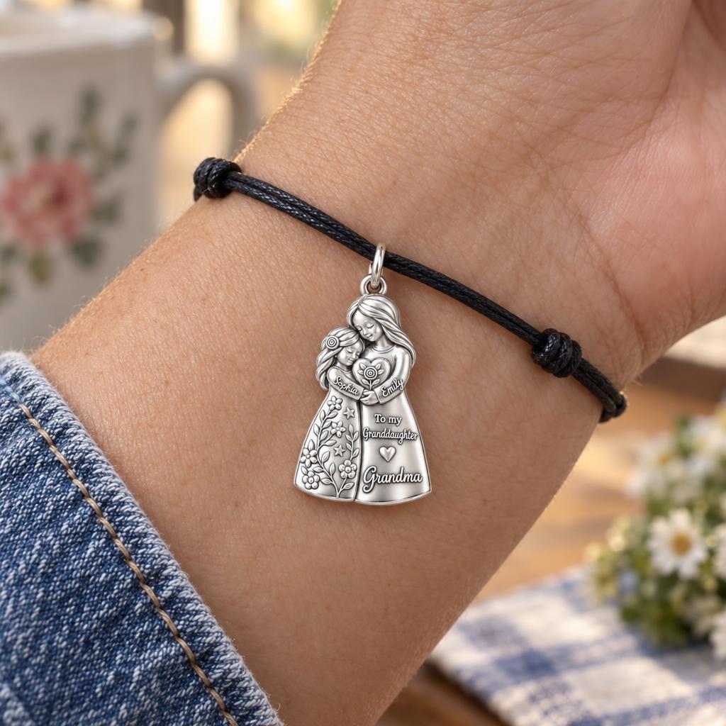 Heartfelt Huddle Charm Bracelet – Personalized Granddaughter Gift – worn on the wrist on a black cord bracelet