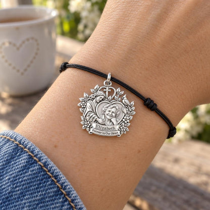 Heavenly Guardian Portrait Charm Bracelet – Personalized Mom Gift – worn on the wrist on a black cord bracelet