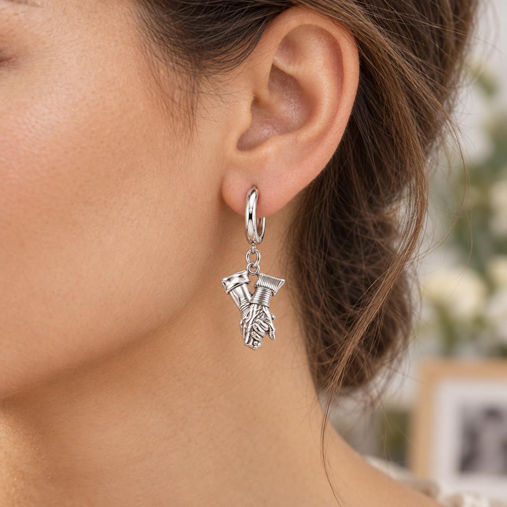 Held Together Custom Hand Huggie Charm Earrings – worn / in use