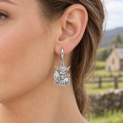 Highland Cow and Calf Huggie Charm Earrings – worn / in use
