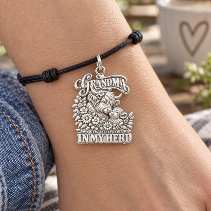 Highland Cow Herd Charm Bracelet – Personalized Grandma Gift – worn on the wrist on a black cord bracelet
