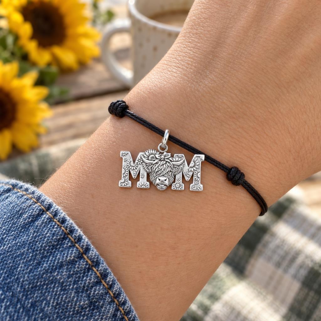 Highland Cow Sunflower Charm Bracelet – Personalized Mom Gift – worn on the wrist on a black cord bracelet