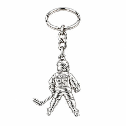Hockey Star In Motion Charm Keychain – silver, front view