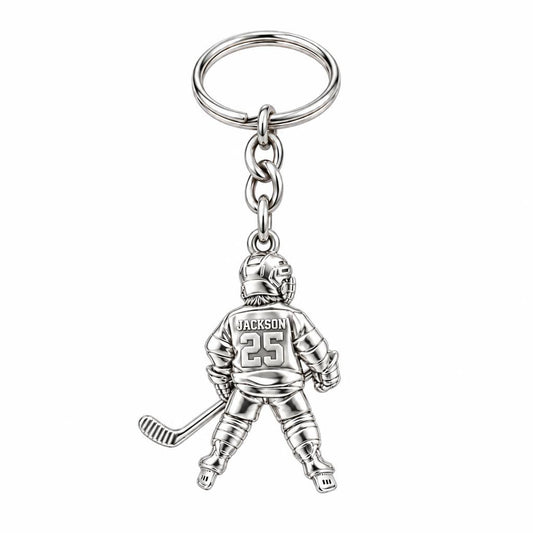 Hockey Star In Motion Charm Keychain – silver, front view