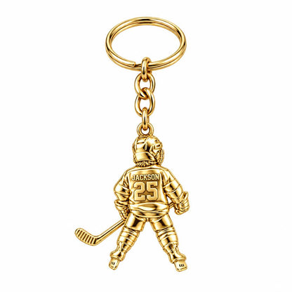 Hockey Star In Motion Charm Keychain – 18K gold, front view