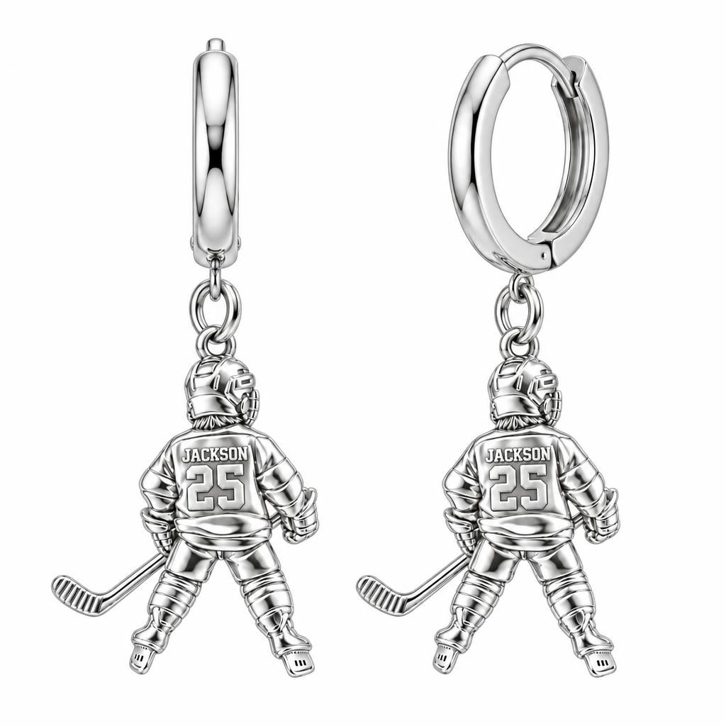 Hockey Star In Motion Huggie Charm Earrings – silver, front view