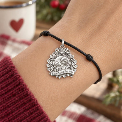 Holly Wreath Photo Charm Bracelet – Personalized Mom Gift – worn on the wrist on a black cord bracelet