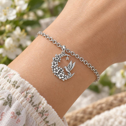 Hummingbird and Moon Blossom Charm Bracelet Set – worn / in use