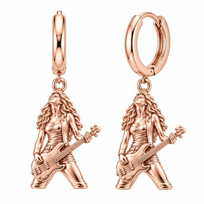 Immersed Bassist Under Amber Lights Huggie Charm Earrings – rose gold, front view
