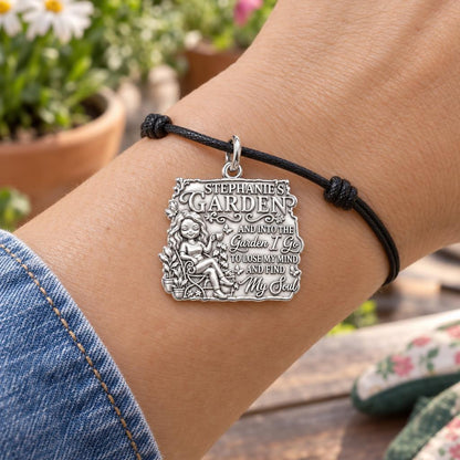 Into The Garden Charm Bracelet – Personalized Gardener Gift – worn on the wrist on a black cord bracelet