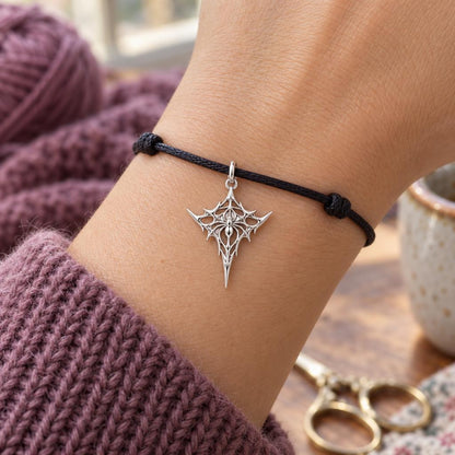 Intricate Weaver Spider Charm Bracelet – Personalized Gift – worn on the wrist on a black cord bracelet