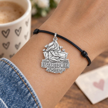 It Started With A Message Charm Bracelet – Personalized Couple Gift – worn on the wrist on a black cord bracelet