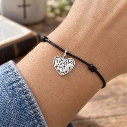 Jesus Heart Charm Bracelet – Personalized Christian Gift – worn on the wrist on a black cord bracelet
