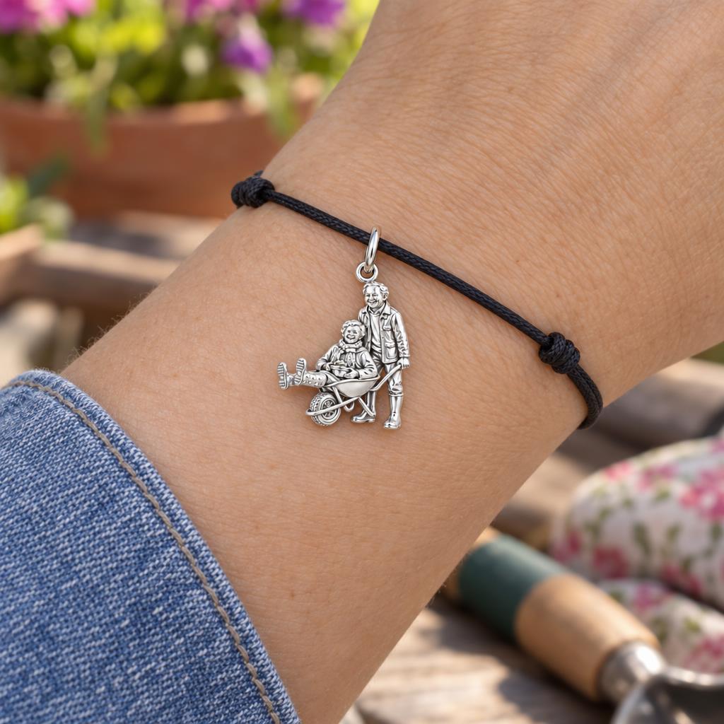 Joyful Garden Ride Charm Bracelet – Personalized Couple Gift – worn on the wrist on a black cord bracelet