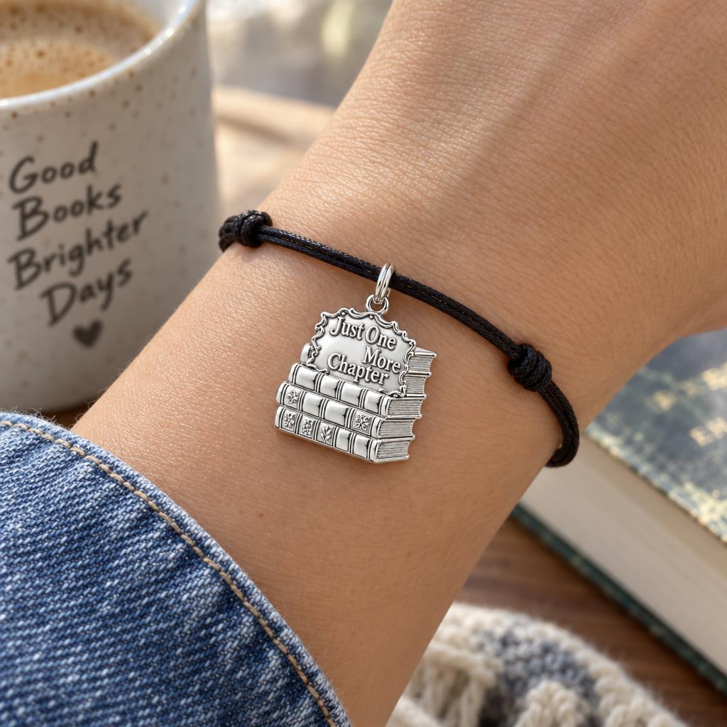 Just One More Chapter Charm Bracelet – Personalized Book Lover Gift – worn on the wrist on a black cord bracelet