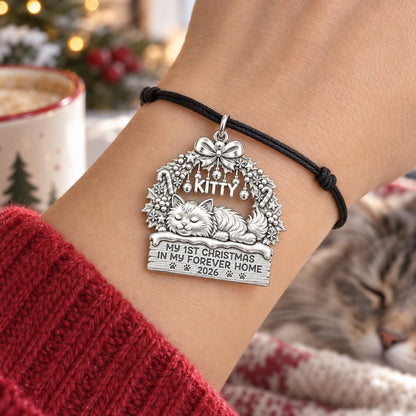 Kitty's First Christmas Charm Bracelet – Personalized Cat Mom Gift – worn on the wrist on a black cord bracelet