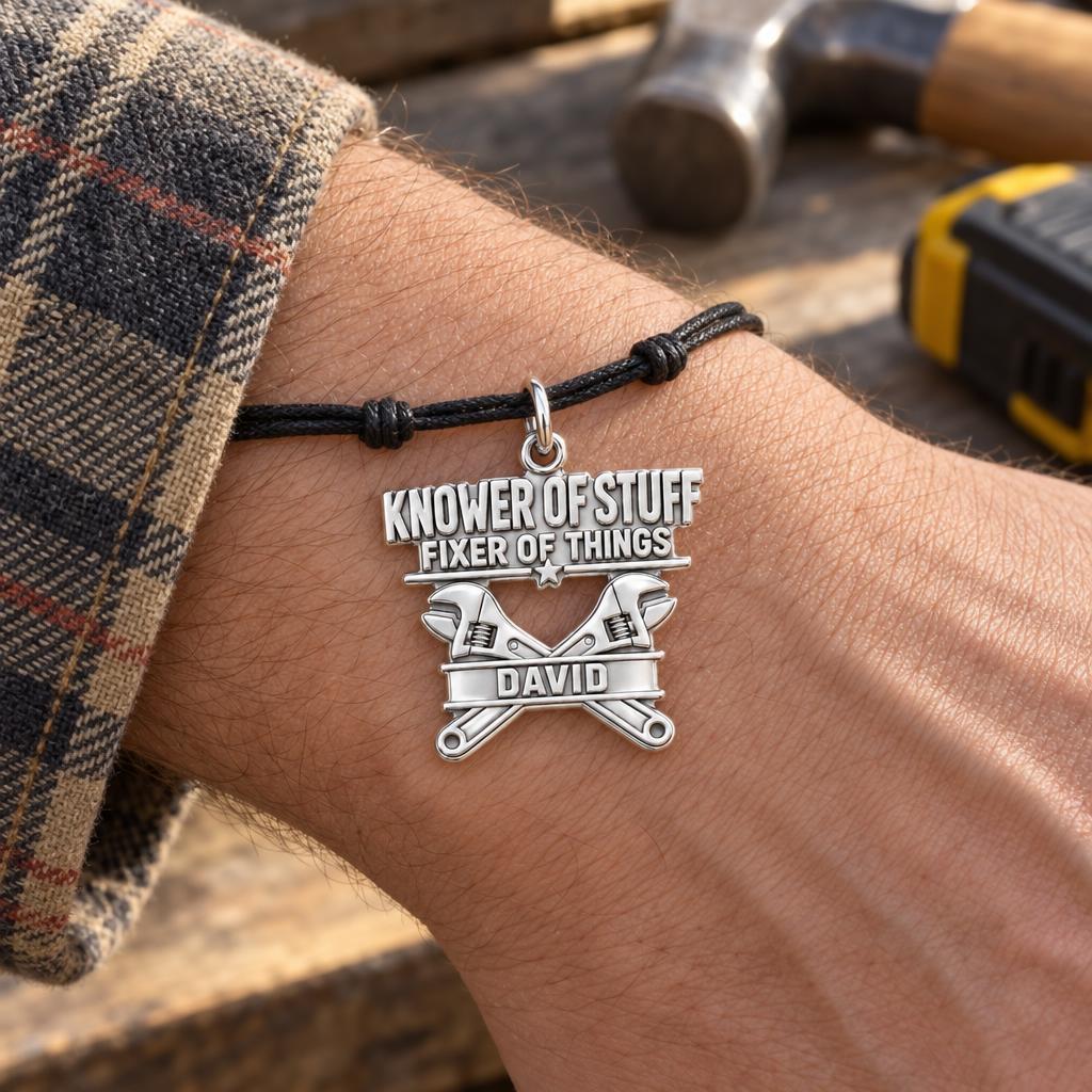 Knower Of Stuff Charm Bracelet – Personalized Dad Gift – worn on the wrist on a black cord bracelet