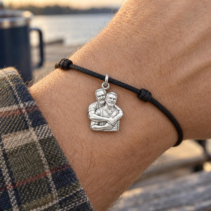 Lifelong Embrace Charm Bracelet – Personalized Couple Gift – worn on the wrist on a black cord bracelet