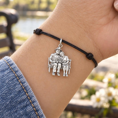 Lifetime Love Park Bench Charm Bracelet – Personalized Couple Gift – worn on the wrist on a black cord bracelet