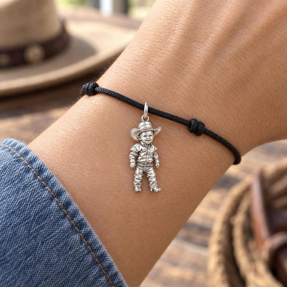 Little Cowboy Portrait Charm Bracelet – Personalized Baby Gift – worn on the wrist on a black cord bracelet