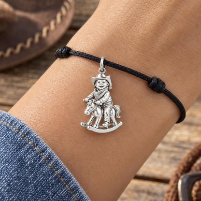 Little Cowboy Rocking Horse Charm Bracelet – Personalized Mom Gift – worn on the wrist on a black cord bracelet