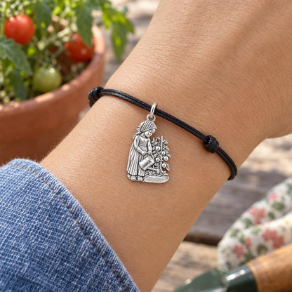 Little Gardener Charm Bracelet – Personalized Baby Gift – worn on the wrist on a black cord bracelet