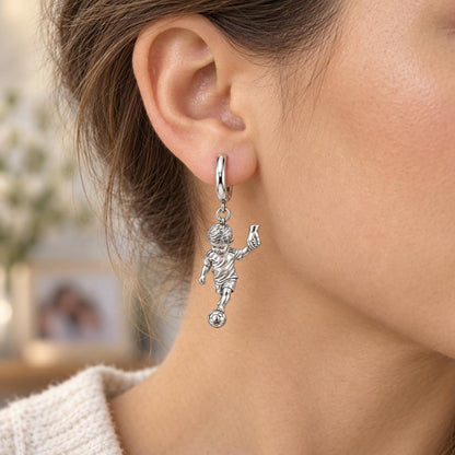 Little Kicker Holding Hands Huggie Charm Earrings – worn / in use