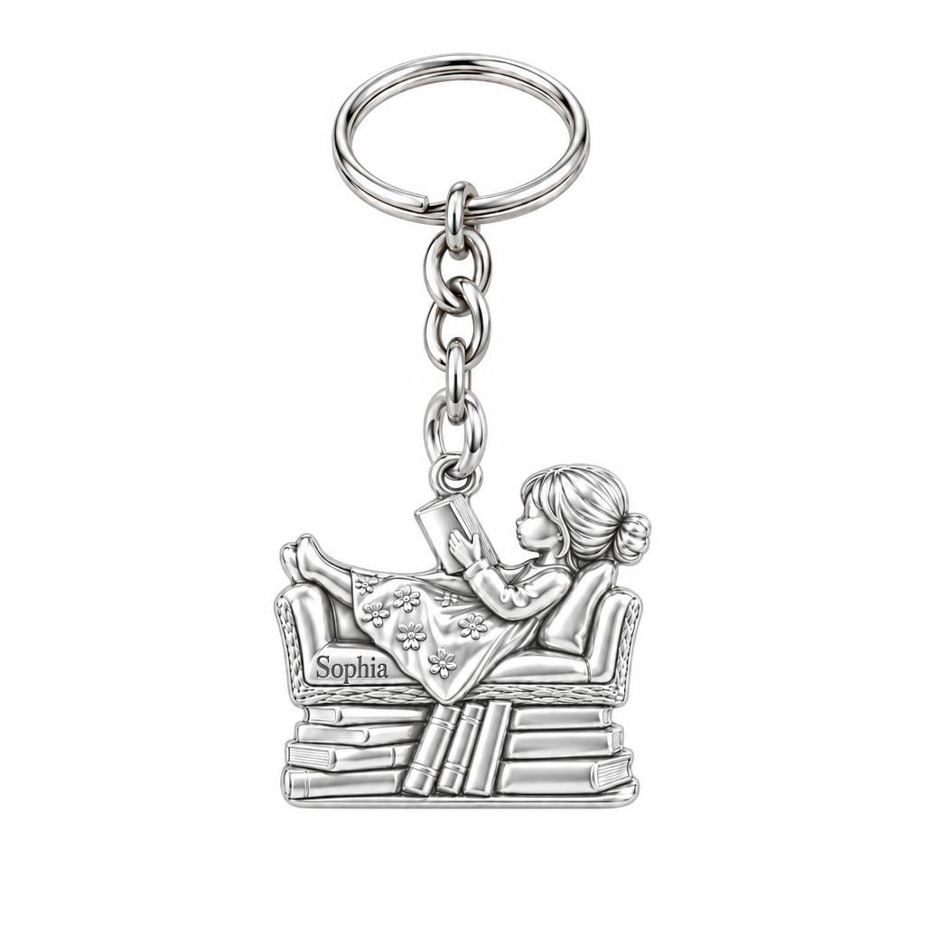 Little Reader on Book Stack Charm Keychain – silver, front view
