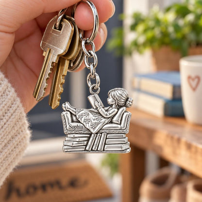 Little Reader on Book Stack Charm Keychain – worn / in use