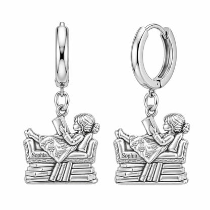 Little Reader on Book Stack Huggie Charm Earrings – silver, front view