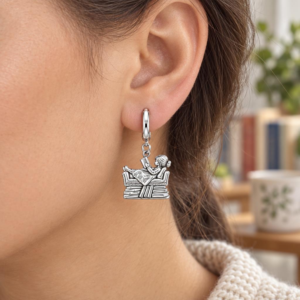 Little Reader on Book Stack Huggie Charm Earrings – worn / in use