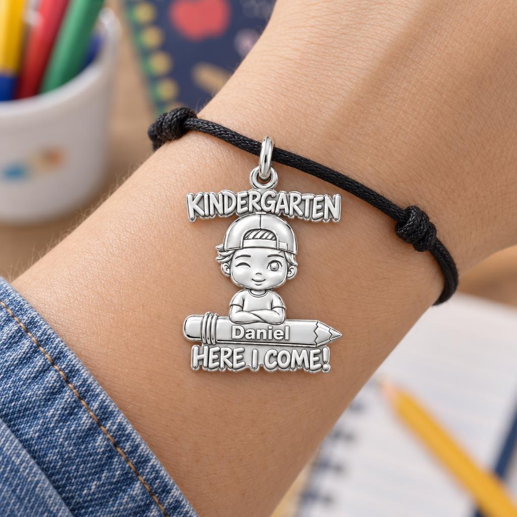 Little Scholar First Day Charm Bracelet – Personalized Mom Gift – worn on the wrist on a black cord bracelet