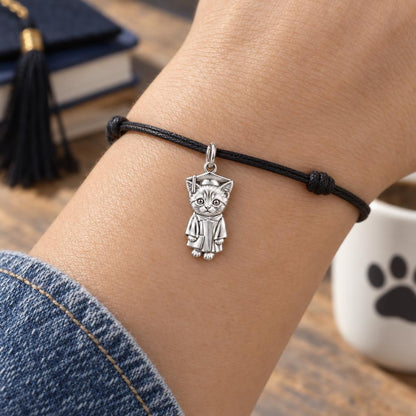 Little Scholar Pet Charm Bracelet – Personalized Grad Gift – worn on the wrist on a black cord bracelet