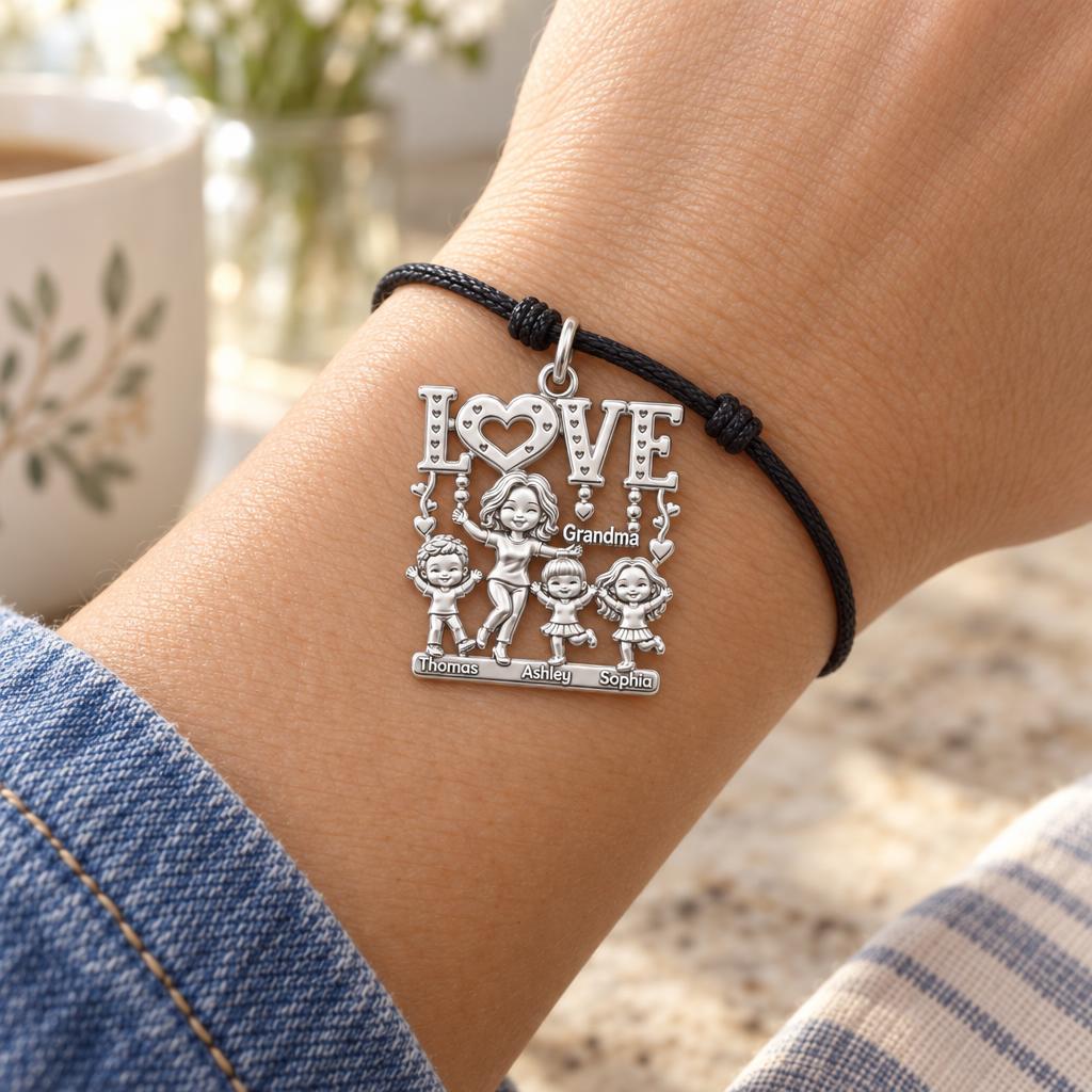 Love Grows Here Charm Bracelet – Personalized Grandma Gift – worn on the wrist on a black cord bracelet