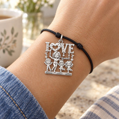Love Grows Here Charm Bracelet – Personalized Grandma Gift – worn on the wrist on a black cord bracelet