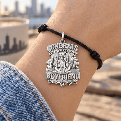 Lucky Bastard Cityscape Charm Bracelet – Personalized Couple Gift – worn on the wrist on a black cord bracelet