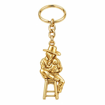 Lullaby in the Saddle Charm Keychain – 18K gold, front view
