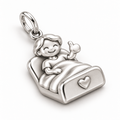 Nurse Patient Thumbs Up Dangle Charm | macro face-up oblique view | 50795e251ae76fc62d345f10b1394237e0089d776d06d1f89061d9b5d48f4f90