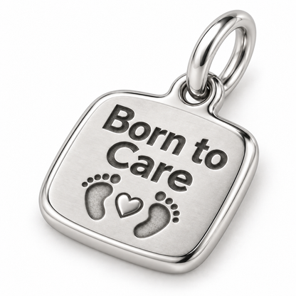 Born to Care Engraved Nurse Charm | macro face-up oblique view | 0a36ebbf0fef7188f963f06fef30c4c5aedfc5e584d06decb31c272c1c048577