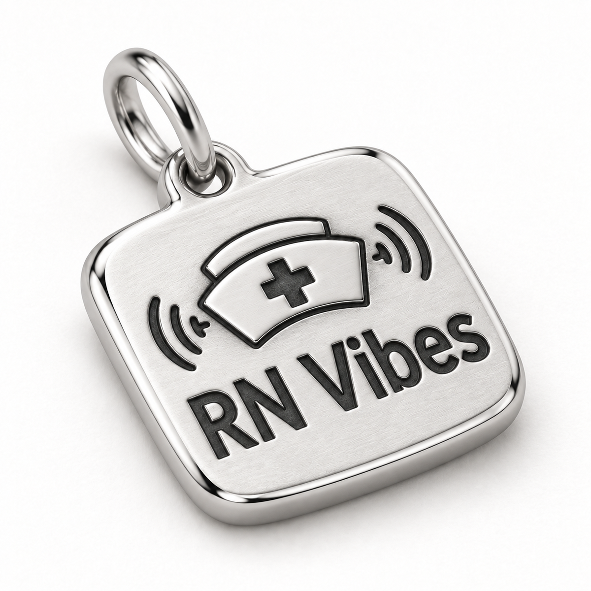 RN Vibes Engraved Nurse Charm | macro face-up oblique view | 32fbf9a0249c61a4214d0956718bac1fc949d0d326dee32bc5f6b983bb1e3989
