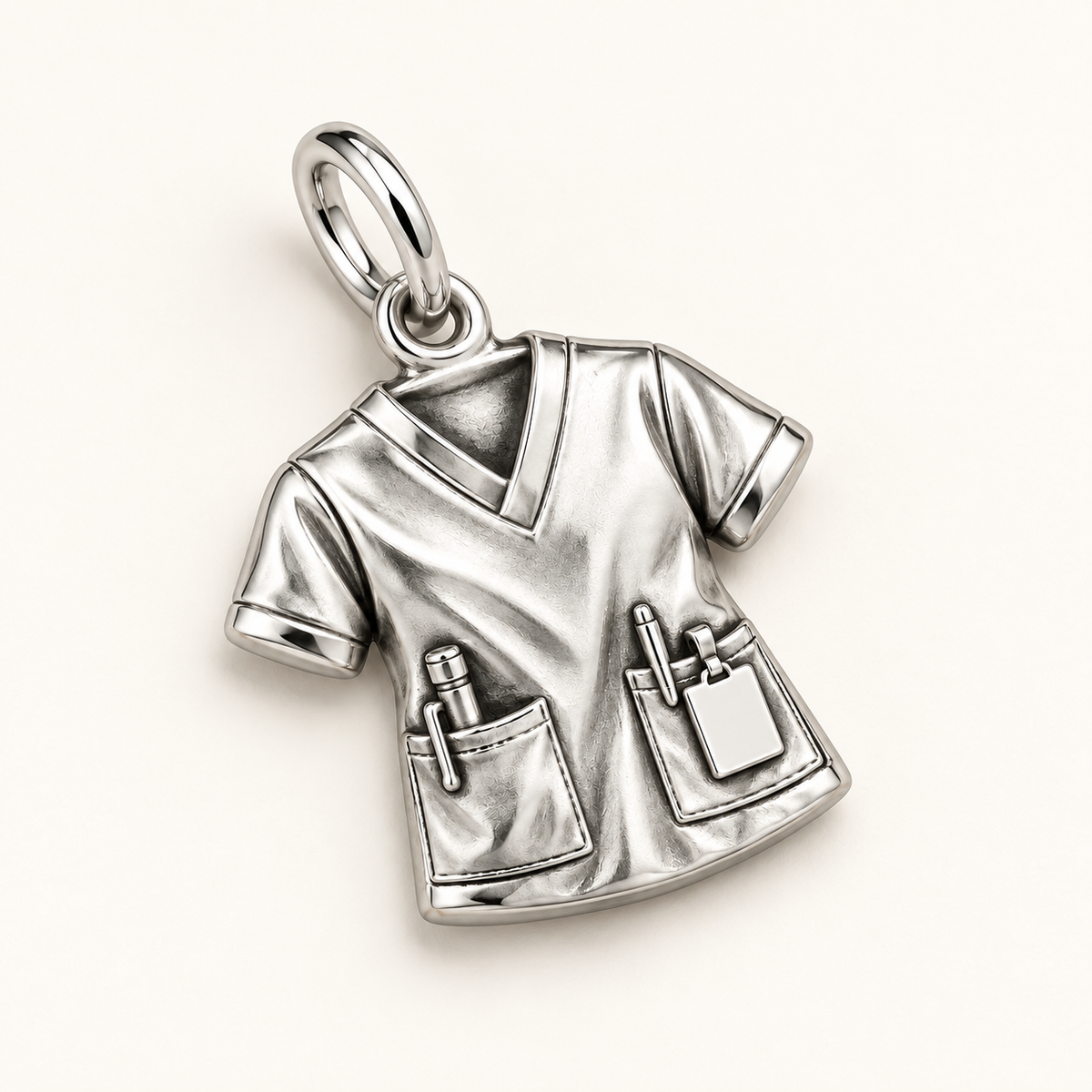 Nurse Scrub Top Dangle Charm | macro face-up oblique view | 4fe1f7e0f9d72af9a798f8b22709059d351911935fa768ea81d1adf7aaa3d0dd
