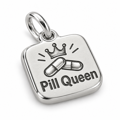 Pill Queen Engraved Nurse Charm | macro face-up oblique view | 7592929d222f2aaa5a1a0d43f6d3833ce08ad5a38e17b45d227a27da07428600