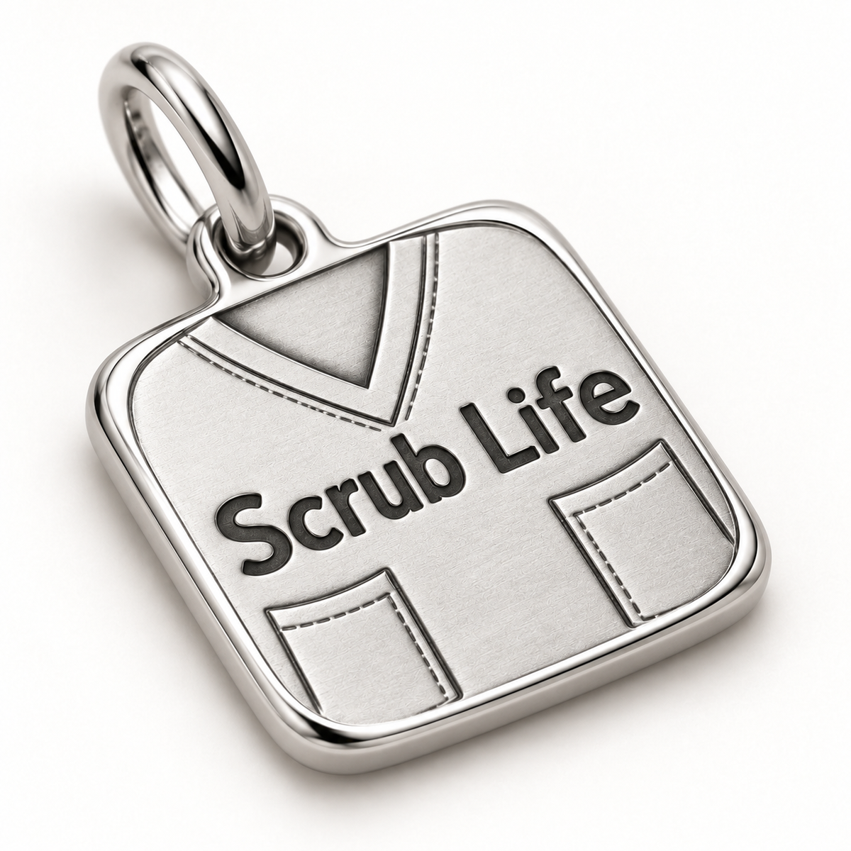 Scrub Life Uniform Engraved Nurse Charm | macro face-up oblique view | e0031eca9a4579ce0fac14b2536a143607fbdf059890c327465dc38c1a4b6f38