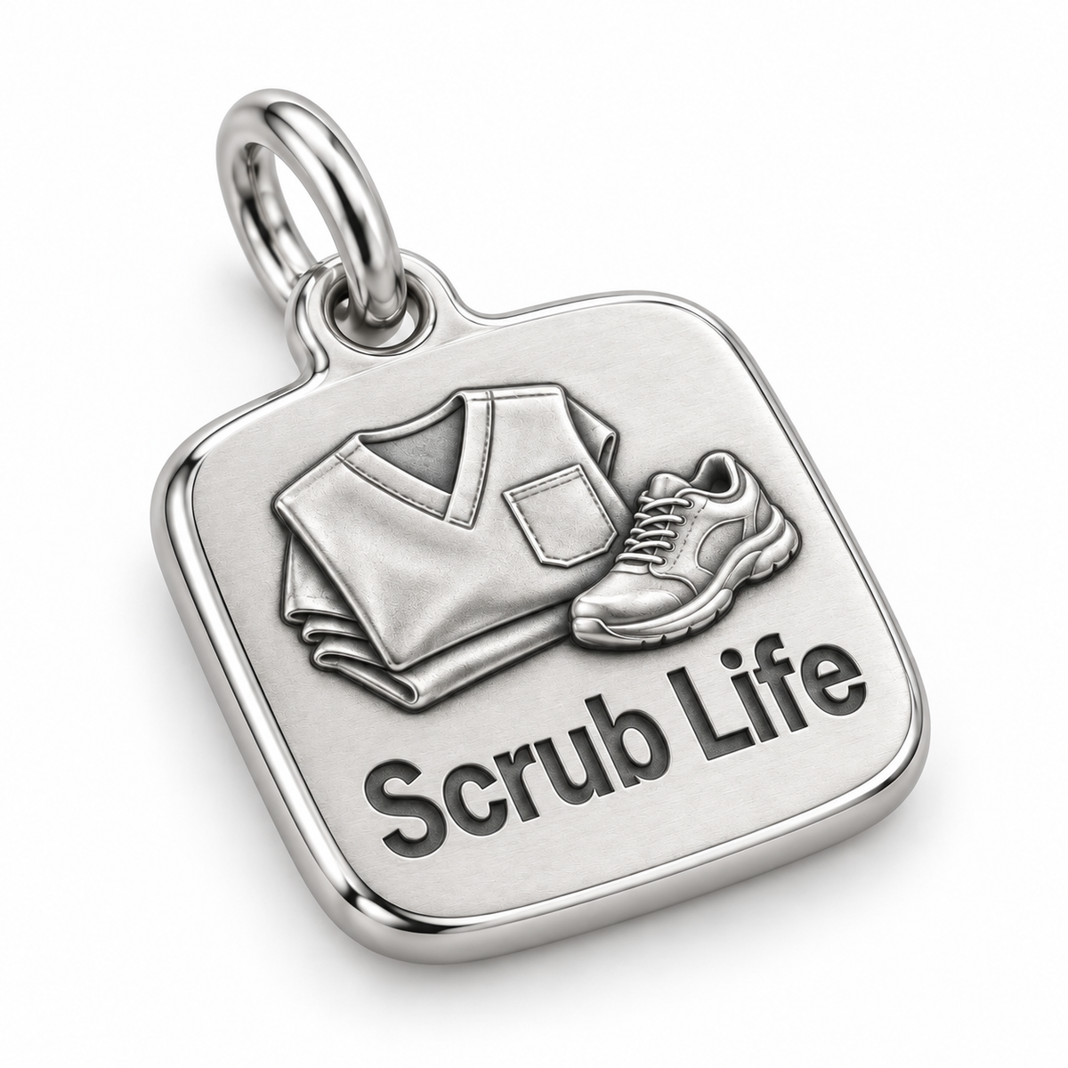 Scrub Life Folded Scrubs Engraved Nurse Charm | macro face-up oblique view | dee4fab2eebc3d9a96a19f414d3f778ee51c71fde195b592f1c5a0d09e32470f