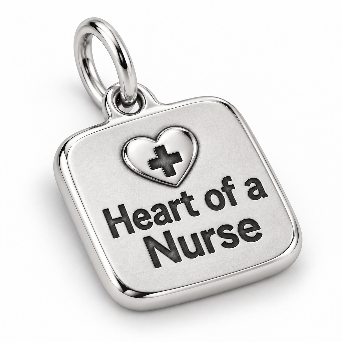 Heart of a Nurse Engraved Nurse Charm | macro face-up oblique view | c1abb278484a0e4b480db761f4208086cbd108ecf449bbbf097bd6a12aa9fab1